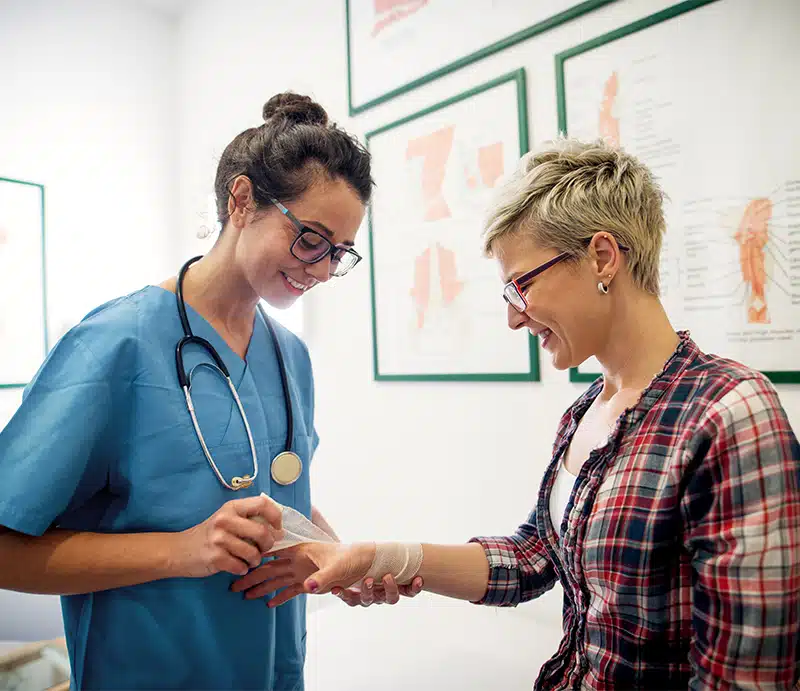wound care provider bandaging wound